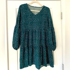 Long sleeve green and white polka-dot dress.